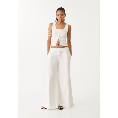 Pantalon palazzo fluide en lin Écru XS - Stradivarius - Modalova
