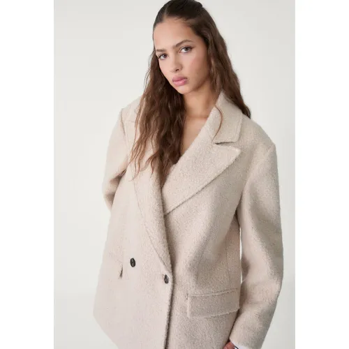 Manteau court en mouton synthétique Écru XS - Stradivarius - Modalova