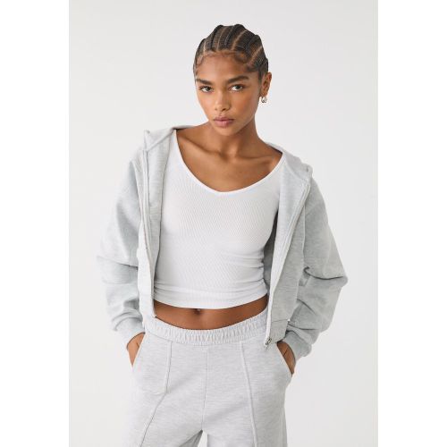 Sweat à capuche et poches XS - Stradivarius - Modalova