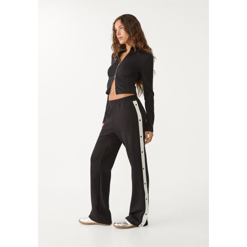 Pantalon soft à boutons sur les côtés XS - Stradivarius - Modalova