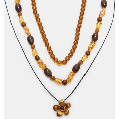 Ensemble de 3 colliers à perles et fleur OS - Stradivarius - Modalova