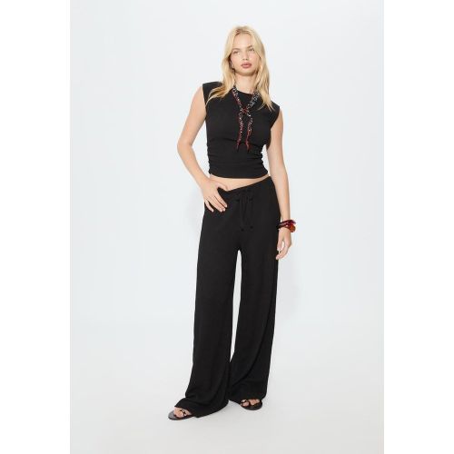 Pantalon fluide effet froissé XS - Stradivarius - Modalova