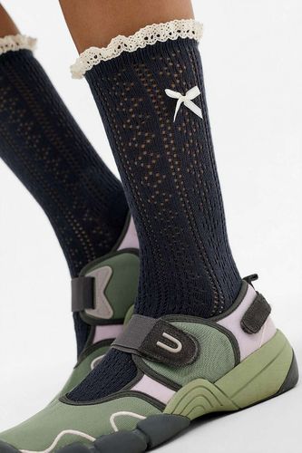 Chaussettes à naud en pointelle en taille: TAILLE UNIQUE - Out From Under - Modalova