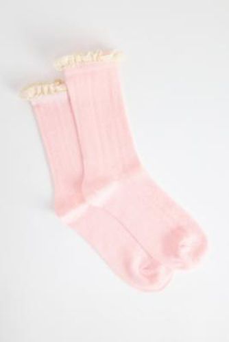 Chaussettes à volants pointelle UO en taille: TAILLE UNIQUE - Urban Outfitters - Modalova