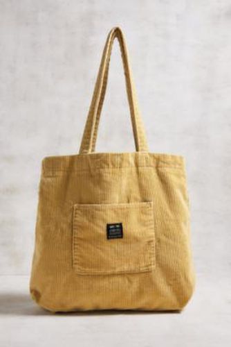 UO - Fourre-tout en velours côtelé avec poche par en Yellow - Urban Outfitters - Modalova
