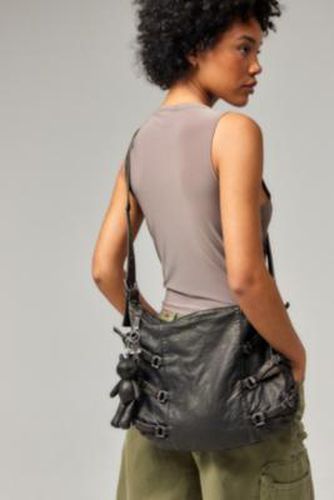 UO - Sac souple à boucles en simili-cuir par en Noir - Urban Outfitters - Modalova