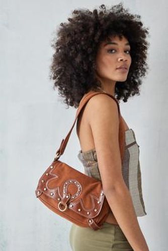 UO - Sac à bandoulière en cuir clouté style western - Urban Outfitters - Modalova