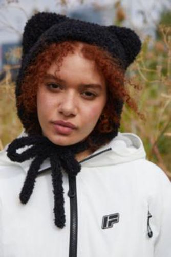 Bonnet en peluche UO par en taille: TAILLE UNIQUE - Urban Outfitters - Modalova