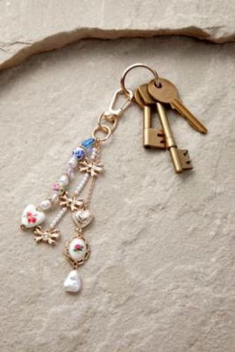 Porte-clés à breloques kitsch par en - Urban Outfitters - Modalova