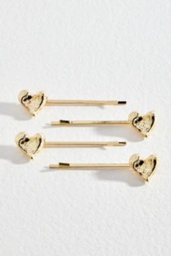 Barrettes pour Cheveux en Forme de Caur Fondu Doré taille: TAILLE UNIQUE - Urban Outfitters - Modalova