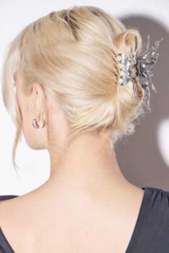 Pince à cheveux papillon en métal fondu par en Argent - Urban Outfitters - Modalova