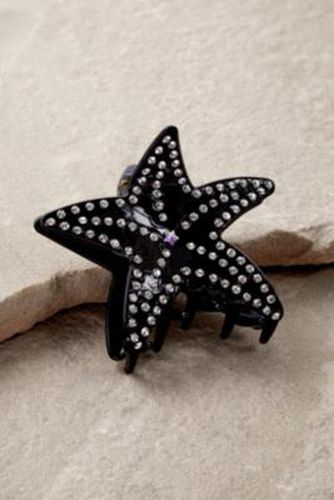 Pince à cheveux étoile de mer à strass par en Noir - Urban Outfitters - Modalova