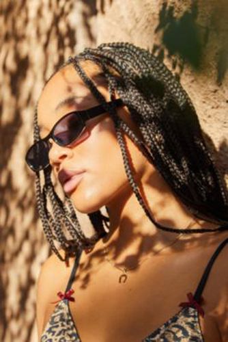 UO - Lunettes de soleil ovales minces Josephine par en Noir - Urban Outfitters - Modalova