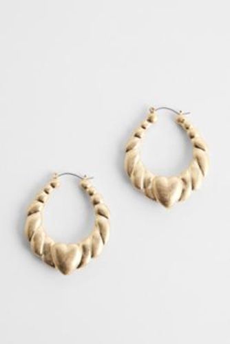 Boucles d'oreilles créoles caur épaisses UO par taille: TAILLE UNIQUE - Urban Outfitters - Modalova