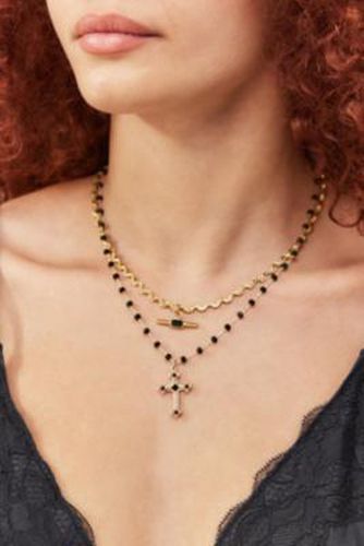 Collier Pendentif Croix Perle Noire en taille: TAILLE UNIQUE - Urban Outfitters - Modalova