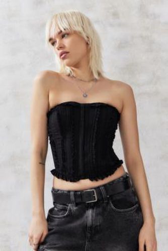 UO - Haut bandeau Harley style corset par en taille: 2XS - Urban Outfitters - Modalova