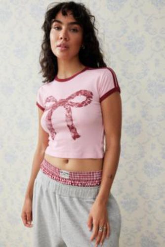 T-shirt bébé à naud en dentelle UO par en taille: XS - Urban Outfitters - Modalova