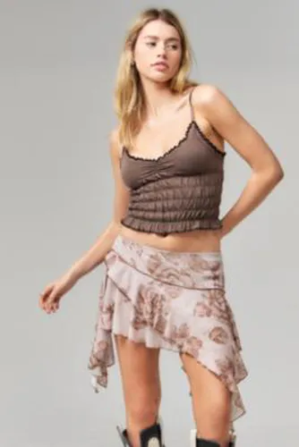 UO - Mini-jupe asymétrique à motif floral par en taille: XS - Urban Outfitters - Modalova
