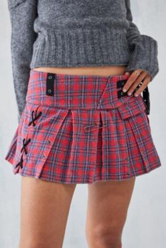 UO - Mini-jupe à carreaux écossais et boucles par en taille: 2XS - Urban Outfitters - Modalova