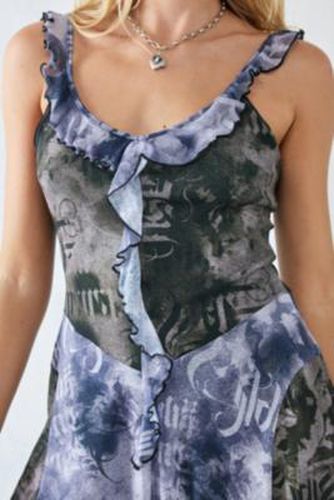 UO - Mini-robe en maille dotée de volants et d'un texte Teya par en taille: 2XS - Urban Outfitters - Modalova