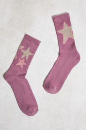 UO - Chaussettes étoiles roses par - Urban Outfitters - Modalova