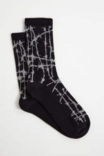 Chaussettes en fil barbelé UO par en taille: TAILLE UNIQUE - Urban Outfitters - Modalova