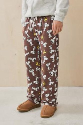 UO - Pantalon de survêtement à imprimé Snoopy Roller par en Marron taille: Medium - Urban Outfitters - Modalova