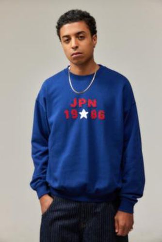 Sweat-shirt appliqué UO Japon 1986 par en taille: G - Urban Outfitters - Modalova