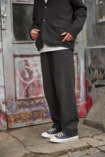 Pantalon de pyjama en seersucker noir - Loom - Modalova