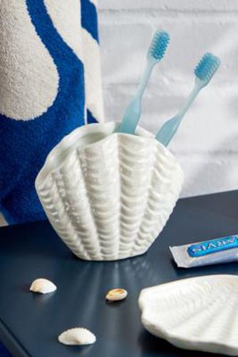 Oorte-brosse à dents coquillage par en - Urban Outfitters - Modalova