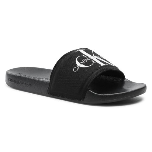 Mules / sandales de bain Calvin Klein Jeans Slide Monogram Co YM0YM00061 Black BDS - Chaussures.fr - Modalova