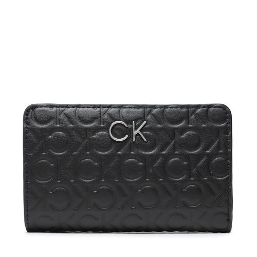 Portefeuille grand format Calvin Klein Re Lock Bifold Wallet Emb Mono K60K610240 BAX - Chaussures.fr - Modalova