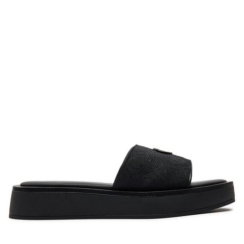 Mules / sandales de bain Calvin Klein Flatform Slide Relock Mono Jacq HW0HW01488 Noir - Chaussures.fr - Modalova