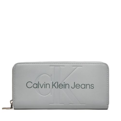 Portefeuille grand format Calvin Klein Jeans Sculpted Zip Around Mono K60K607634 Gris - Chaussures.fr - Modalova