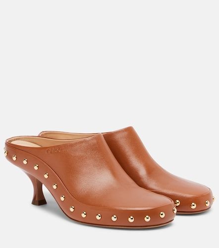 Chloé Mules en cuir à clous - Chloe - Modalova