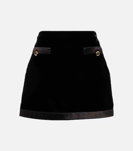 Miu Miu Mini-jupe à taille haute - Miu Miu - Modalova