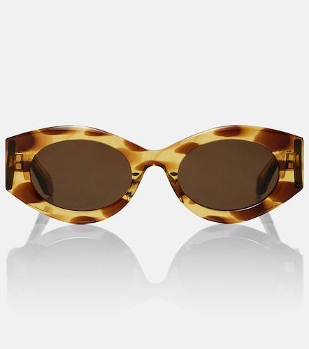 Alaïa Lunettes de soleil ovales à logo - Alaia - Modalova