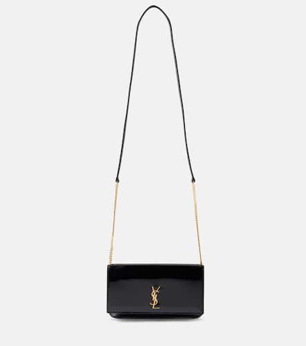 Pochette pour téléphone Cassandre en cuir verni - Saint Laurent - Modalova