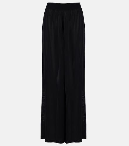Alaïa Pantalon ample à taille haute - Alaia - Modalova