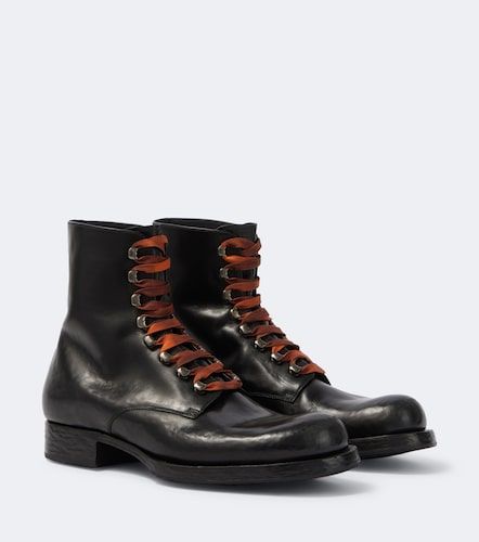 Prada Bottes à lacets en cuir - Prada - Modalova