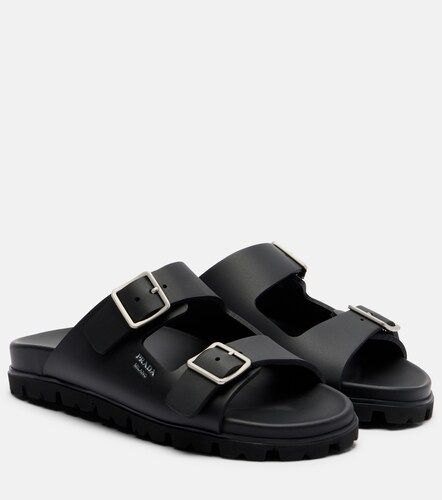 Prada Mules à logo - Prada - Modalova
