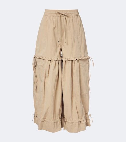 Pantalon ample en coton mélangé à volants - Ganni - Modalova
