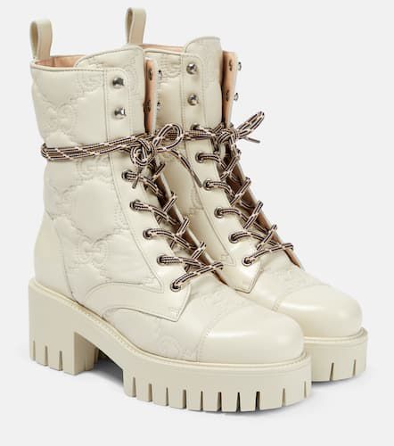 Gucci Bottes GG en cuir matelassé - Gucci - Modalova