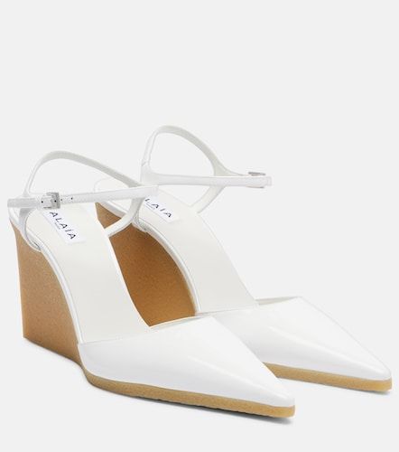 Alaïa Escarpins compensés 90 en cuir verni - Alaia - Modalova