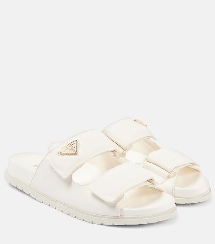 Prada Mules en cuir à logo - Prada - Modalova