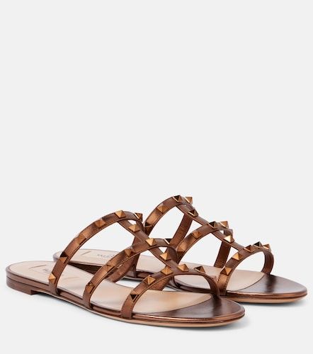 Mules Rockstud en cuir métallisé - Valentino Garavani - Modalova