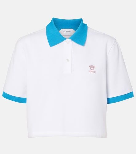 Versace Polo court en coton à logo - Versace - Modalova