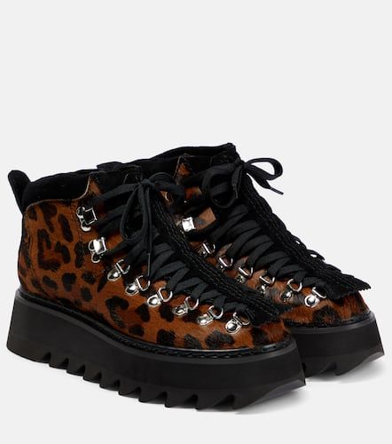Bottines en cuir à imprimé léopard - Junya Watanabe - Modalova