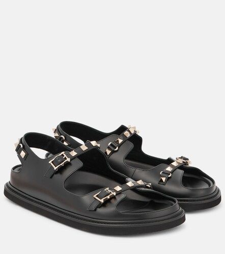 Sandales plates Rockstud en cuir - Valentino Garavani - Modalova