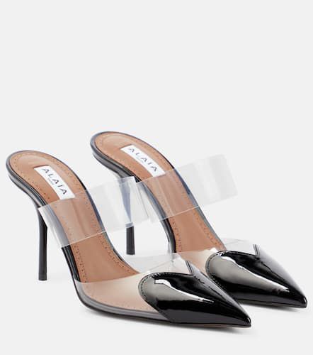 Alaïa Mules Cœur en cuir verni - Alaia - Modalova